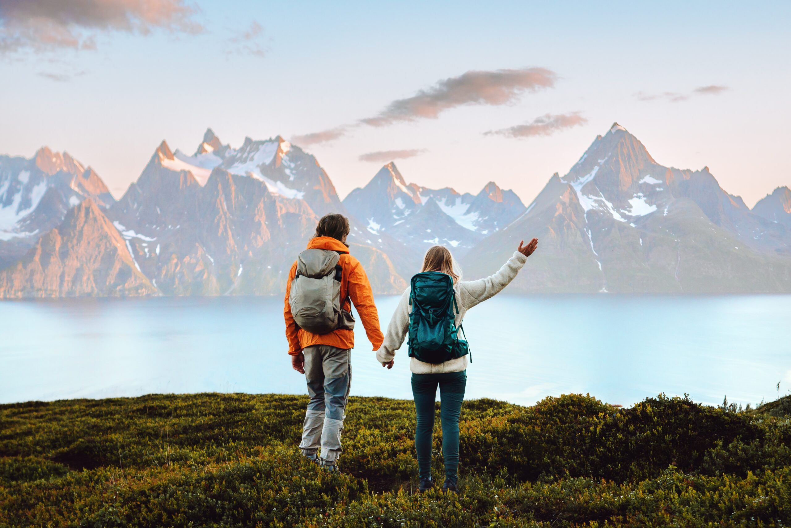 Couple,In,Love,Hiking,Travel,In,Norway,Man,And,Woman